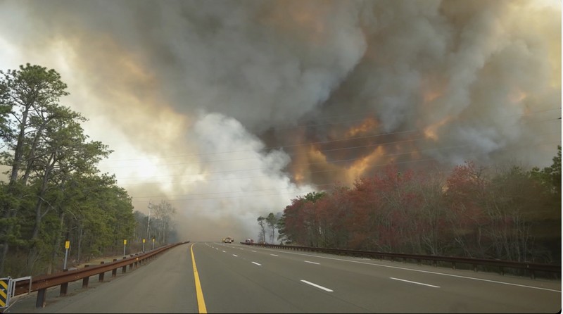 Wildfire New Jersey Smoke fills the sky from a wildfire in Lacey Townships, N.J. on Tuesday, April 22, 2025. (New Jersey Department of Environmental Protection via AP)