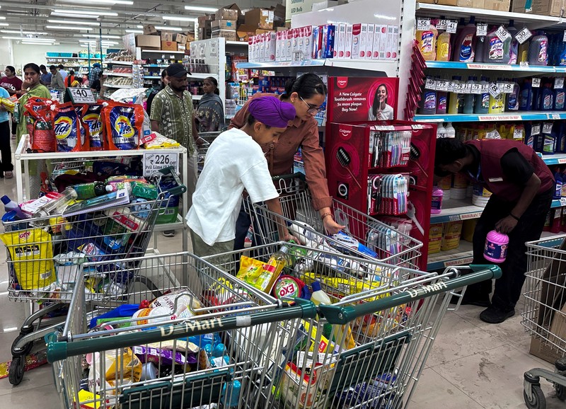 People shop for essential goods at a supermarket in Amritsar, India, May 9, 2025. REUTERS/Francis Mascarenhas