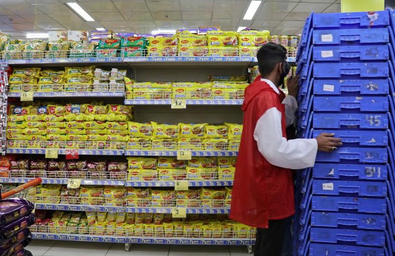 People shop for essential goods at a supermarket in Amritsar, India, May 9, 2025. REUTERS/Francis Mascarenhas