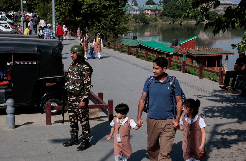 Students attend morning assembly as schools reopen following the ceasefire announcement between India and Pakistan, in Muzaffarabad, Pakistani Kashmir, May 13, 2025. REUTERS/Naseer ud Din