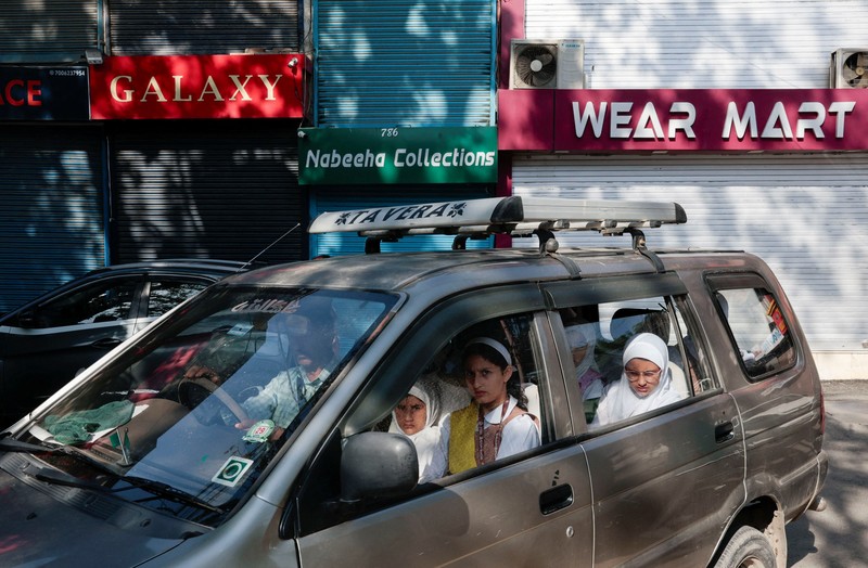 INDIA-PAKISTAN/ Students attend morning assembly as schools reopen following the ceasefire announcement between India and Pakistan, in Muzaffarabad, Pakistani Kashmir, May 13, 2025. REUTERS/Naseer ud Din