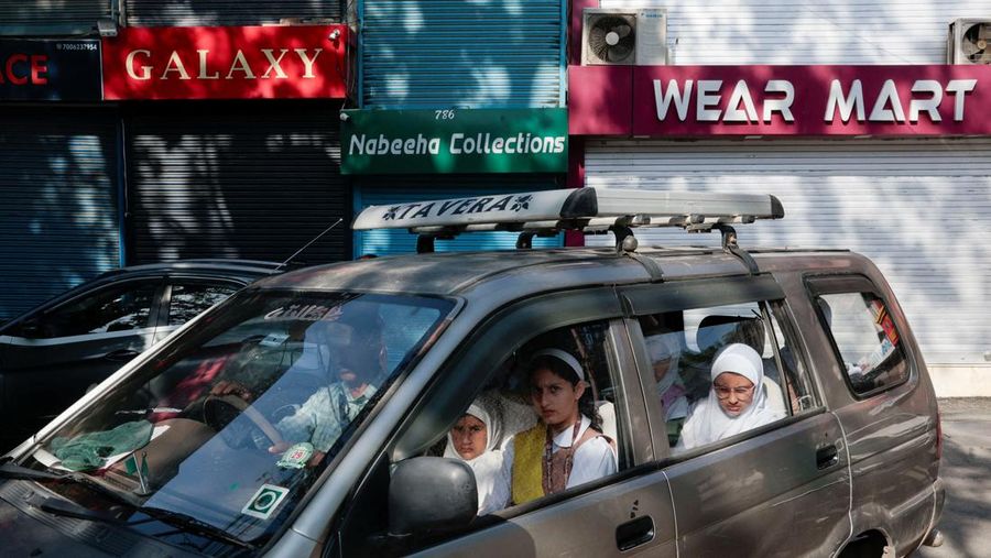 INDIA-PAKISTAN/ Students attend morning assembly as schools reopen following the ceasefire announcement between India and Pakistan, in Muzaffarabad, Pakistani Kashmir, May 13, 2025. REUTERS/Naseer ud Din