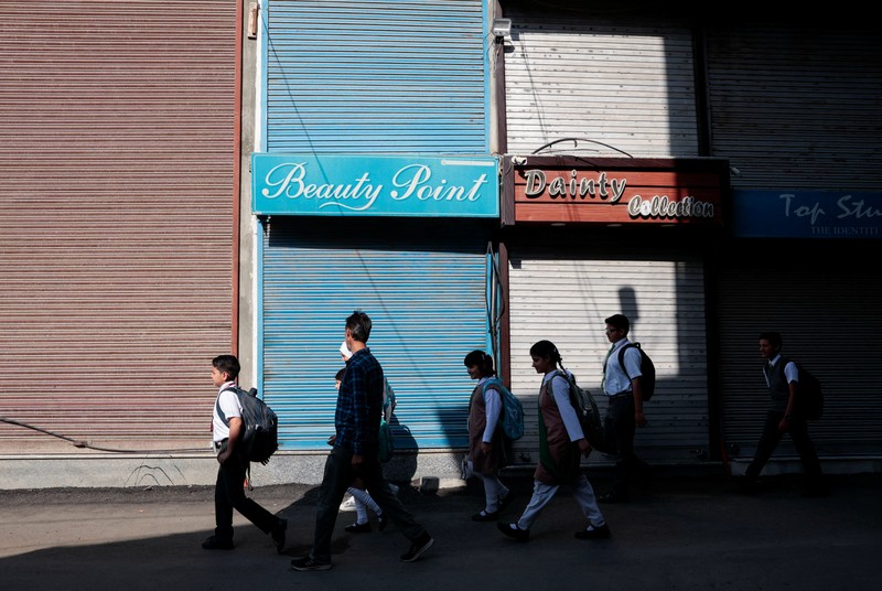 Students attend morning assembly as schools reopen following the ceasefire announcement between India and Pakistan, in Muzaffarabad, Pakistani Kashmir, May 13, 2025. REUTERS/Naseer ud Din