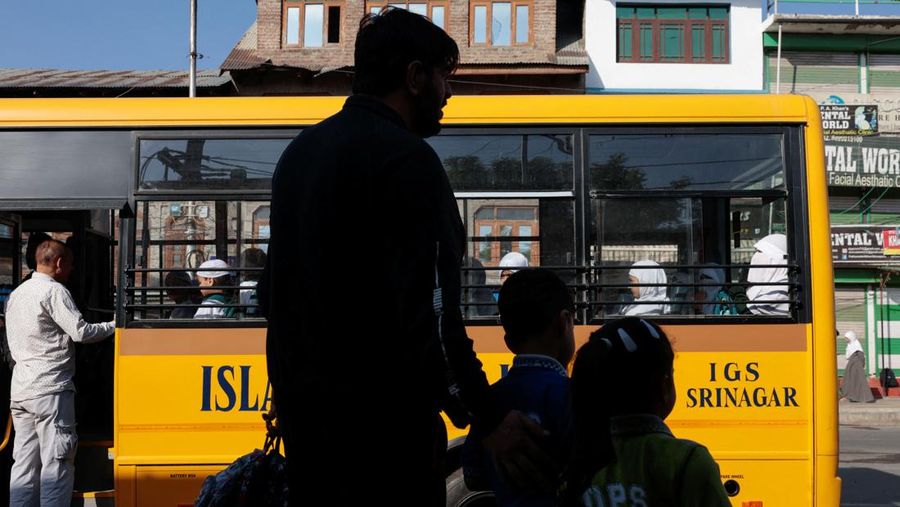 INDIA-PAKISTAN/ Students attend morning assembly as schools reopen following the ceasefire announcement between India and Pakistan, in Muzaffarabad, Pakistani Kashmir, May 13, 2025. REUTERS/Naseer ud Din