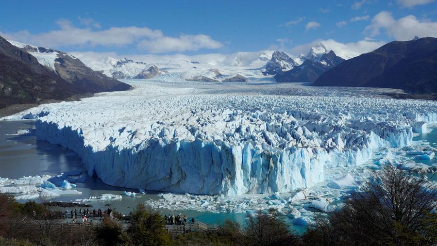 A combination of screengrabs from video shows ice calving off the Perito Moreno glacier into the Lago Argentino (Argentine Lake), in the Parque Nacional Los Glaciares, near the city of El Calafate in the Patagonian province of Santa Cruz, Argentina April 21, 2025. Reuters TV/via REUTERS