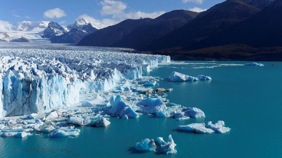 A combination of screengrabs from video shows ice calving off the Perito Moreno glacier into the Lago Argentino (Argentine Lake), in the Parque Nacional Los Glaciares, near the city of El Calafate in the Patagonian province of Santa Cruz, Argentina April 21, 2025. Reuters TV/via REUTERS