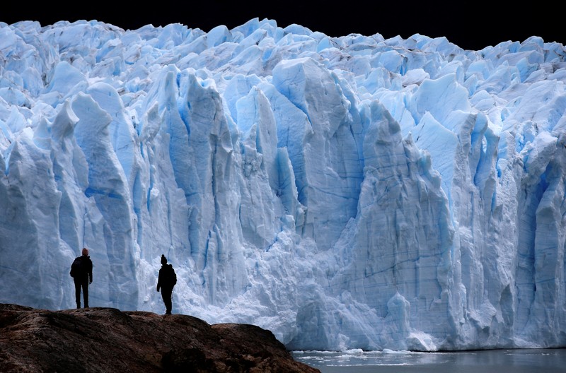 A combination of screengrabs from video shows ice calving off the Perito Moreno glacier into the Lago Argentino (Argentine Lake), in the Parque Nacional Los Glaciares, near the city of El Calafate in the Patagonian province of Santa Cruz, Argentina April 21, 2025. Reuters TV/via REUTERS
