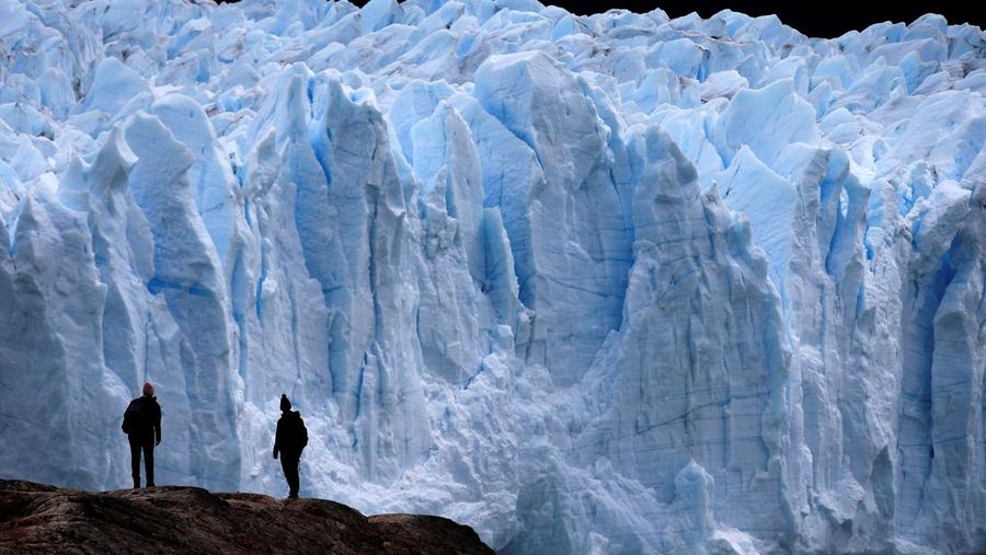 A combination of screengrabs from video shows ice calving off the Perito Moreno glacier into the Lago Argentino (Argentine Lake), in the Parque Nacional Los Glaciares, near the city of El Calafate in the Patagonian province of Santa Cruz, Argentina April 21, 2025. Reuters TV/via REUTERS