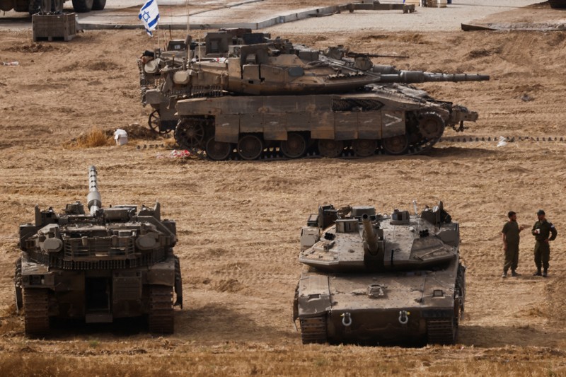 Sebuah tank Israel bermanuver di Gaza, seperti yang terlihat dari sisi Israel di perbatasan Israel-Gaza, 16 Mei 2025. Sebuah tank Israel bermanuver di Gaza, seperti yang terlihat dari sisi Israel di perbatasan Israel-Gaza, 16 Mei 2025. (REUTERS/Ammar Awad)