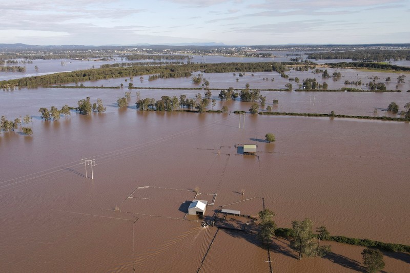 Foto udara menunjukkan daerah yang terendam banjir di dekat Sungai Hunter di Heatherbrae, Australia, Sabtu, (24/5/2025). (REUTERS/Hollie Adams) Foto udara menunjukkan daerah yang terendam banjir di dekat Sungai Hunter di Heatherbrae, Australia, Sabtu, (24/5/2025). (REUTERS/Hollie Adams)
