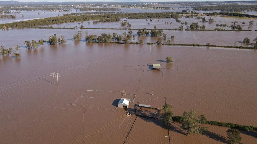 Foto udara menunjukkan daerah yang terendam banjir di dekat Sungai Hunter di Heatherbrae, Australia, Sabtu, (24/5/2025). (REUTERS/Hollie Adams) Foto udara menunjukkan daerah yang terendam banjir di dekat Sungai Hunter di Heatherbrae, Australia, Sabtu, (24/5/2025). (REUTERS/Hollie Adams)