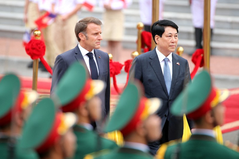 VIETNAM-FRANCE/MACRON France's President Emmanuel Macron and Vietnam's President Luong Cuong shake hands during a meeting at the Presidential Palace in Hanoi on May 26, 2025. NHAC NGUYEN/Pool via REUTERS
