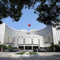 FILE PHOTO: FILE PHOTO: Headquarters of the People's Bank of China (PBOC), the central bank, is pictured in Beijing, China September 28, 2018. REUTERS/Jason Lee/File Photo/File Photo