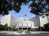 FILE PHOTO: FILE PHOTO: Headquarters of the People's Bank of China (PBOC), the central bank, is pictured in Beijing, China September 28, 2018. REUTERS/Jason Lee/File Photo/File Photo