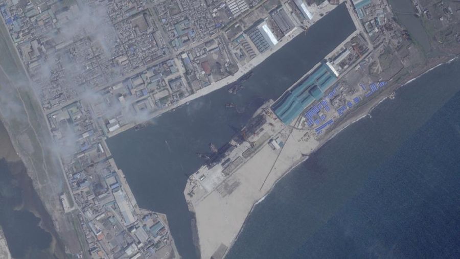 A satellite image shows a North Korean warship covered with a blue tarp after an accident that occurred during its launch at the shipyard, in Chongjin, North Korea, May 23, 2025. Maxar Technologies /Handout via REUTERS THIS IMAGE HAS BEEN SUPPLIED BY A THIRD PARTY. NO RESALES. NO ARCHIVES. MANDATORY CREDIT. MUST NOT OBSCURE LOGO.