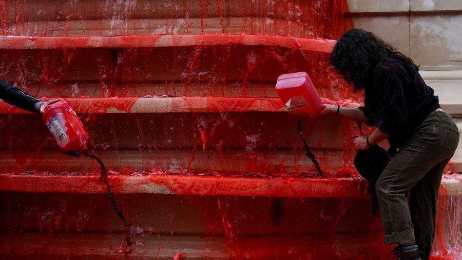 People participate in a demonstration organised by Human rights activists from Amnesty International, Greenpeace, Oxfam and Medecins du Monde, to show support for Palestinians in the Gaza Strip and condemn civilian casualties, at the Fontaine des Innocents in Paris, France May 28, 2025. REUTERS/Abdul Saboor