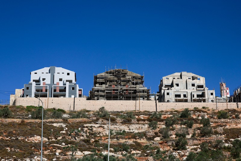 Bangunan-bangunan baru berdiri di sekitar pemukiman Israel Migdalim dekat Nablus, di Tepi Barat yang diduduki Israel, Jumat (30/5/2025). (REUTERS/Ammar Awad) Bangunan-bangunan baru berdiri di sekitar pemukiman Israel Migdalim dekat Nablus, di Tepi Barat yang diduduki Israel, Jumat (30/5/2025). (REUTERS/Ammar Awad)