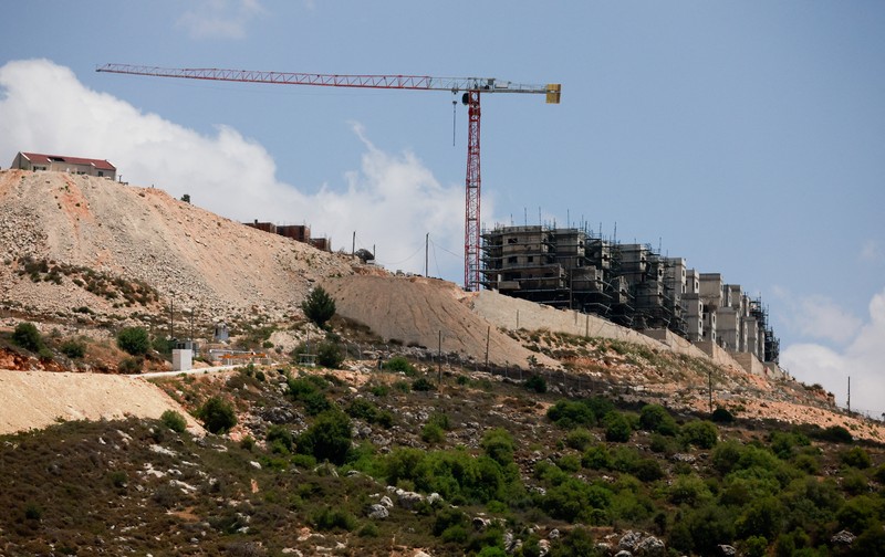 Bangunan-bangunan baru berdiri di sekitar pemukiman Israel Migdalim dekat Nablus, di Tepi Barat yang diduduki Israel, Jumat (30/5/2025). (REUTERS/Ammar Awad) Bangunan-bangunan baru berdiri di sekitar pemukiman Israel Migdalim dekat Nablus, di Tepi Barat yang diduduki Israel, Jumat (30/5/2025). (REUTERS/Ammar Awad)