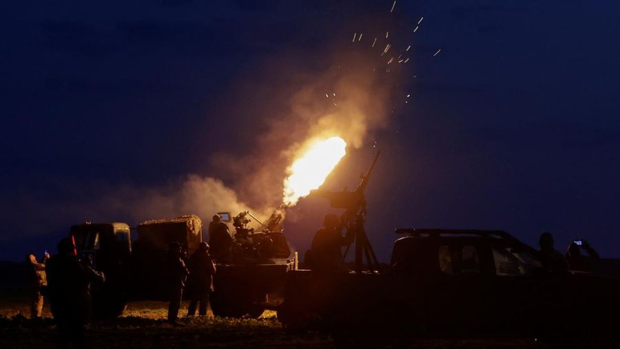 UKRAINE-CRISIS/AIR-DEFENCE Servicemen from the mobile air defence unit of the 115th Separate Mechanized Brigade of the Ukrainian Armed Forces fire a ZU-23-2 anti-aircraft cannon towards a Russian drone during an overnight shift, amid Russia's attack on Ukraine, in Kharkiv Region, Ukraine June 2, 2025. REUTERS/Sofiia Gatilova