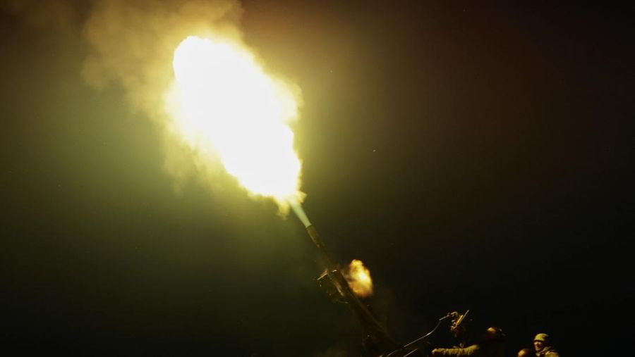 Servicemen from the mobile air defence unit of the 115th Separate Mechanized Brigade of the Ukrainian Armed Forces fire a ZU-23-2 anti-aircraft cannon towards a Russian drone during an overnight shift, amid Russia's attack on Ukraine, in Kharkiv Region, Ukraine June 2, 2025. REUTERS/Sofiia Gatilova