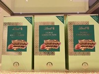 Dubai Chocolate bars stand in a branch of chocolate producer Lindt before the sale of 100 Dubai Chocolate bars starts in Stuttgart, southern Germany, on November 15, 2024. The hype around the chocolate bar - usually filled with pistachio and tahini p