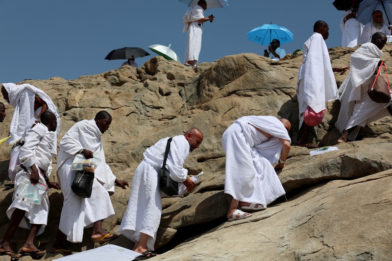 Muslim pilgrims gather at Jabal al-Rahmah, also known as Mount Arafat, during the annual hajj pilgrimage, outside the holy city of Mecca, Saudi Arabia, June 5, 2025. REUTERS/Khaled Abdullah