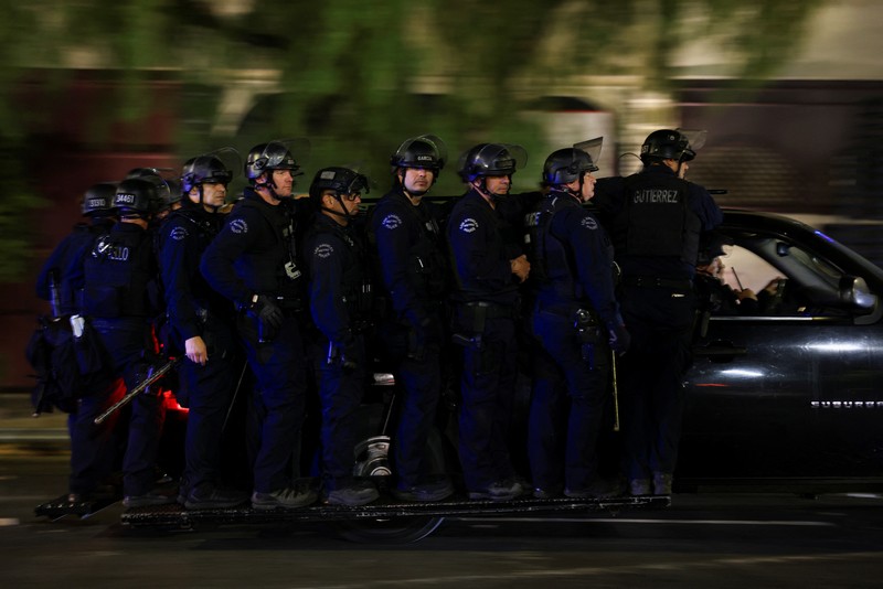 USA-MIGRATION/PROTEST-LOS ANGELES SENSITIVE MATERIAL. THIS IMAGE MAY OFFEND OR DISTURB Waymo cars burn during a protest against federal immigration sweeps in downtown Los Angeles, California, U.S. June 8, 2025. REUTERS/Daniel Cole TPX IMAGES OF THE DAY