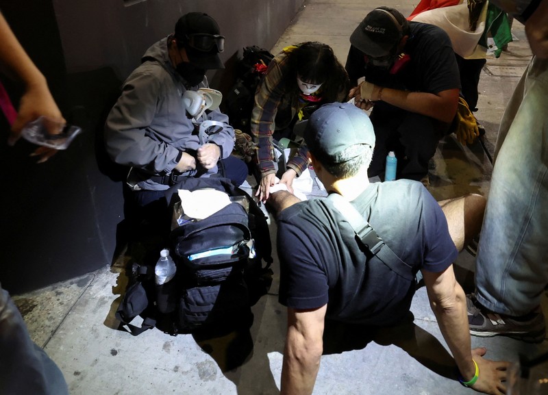 USA-MIGRATION/PROTEST-LOS ANGELES SENSITIVE MATERIAL. THIS IMAGE MAY OFFEND OR DISTURB Waymo cars burn during a protest against federal immigration sweeps in downtown Los Angeles, California, U.S. June 8, 2025. REUTERS/Daniel Cole TPX IMAGES OF THE DAY