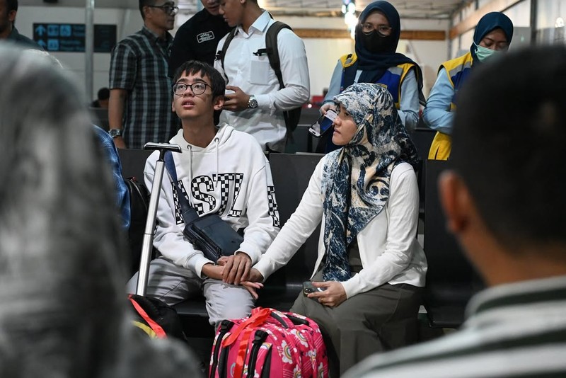 WNI yang dievakuasi dari Iran tiba di Bandara Internasional Soekarno Hatta, di tengah konflik Israel-Iran, di Tangerang dekat Jakarta, Indonesia, 24 Juni 2025. WNI yang dievakuasi dari Iran tiba di Bandara Internasional Soekarno Hatta, di tengah konflik Israel-Iran, di Tangerang dekat Jakarta, Indonesia, 24 Juni 2025. (REUTERS/Ajeng Dinar Ulfiana)