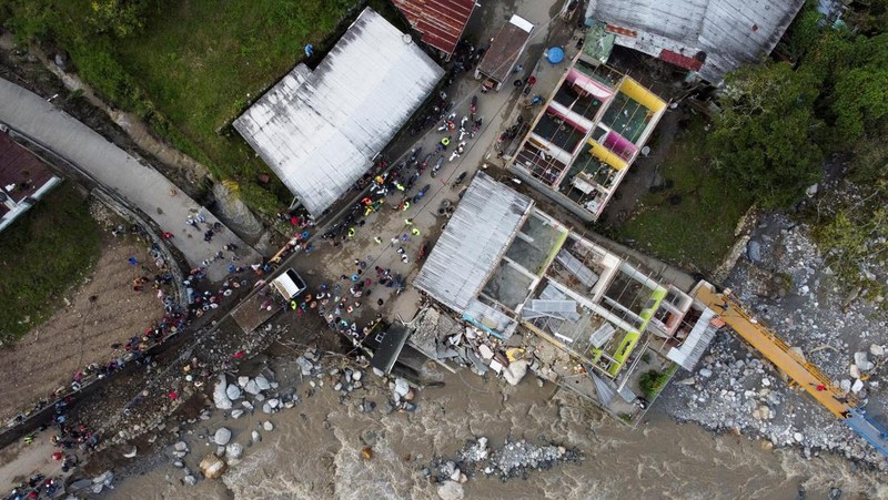 Kerusakan akibat banjir di El Caney, Venezuela, Sabtu (28/6/2025). (REUTERS/Leonardo Fernandez Viloria)