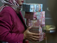 Taiwan Lagi Sakit Kepala, Keluarga TKI Malah Ketawa Bahagia
