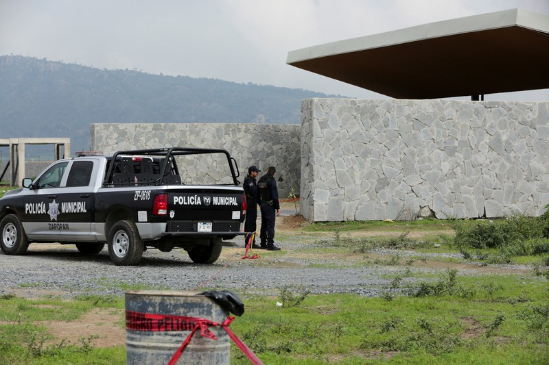 Pihak berwenang bekerja di lokasi kuburan massal yang ditemukan di Zapopan, di negara bagian Jalisco, Meksiko barat, 8 Juli 2025. Pihak berwenang bekerja di lokasi kuburan massal yang ditemukan di Zapopan, di negara bagian Jalisco, Meksiko barat, 8 Juli 2025. (REUTERS/Gabriel Trujillo)