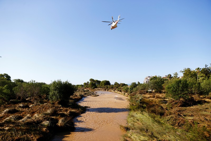 EUROPE-WEATHER/SPAIN-FLOODS Search and rescue operations take place to look for two missing people along the Foix river which overflowed last night due to heavy rains, in Cubelles, Barcelona province, Spain July 13, 2025. REUTERS/Bruna Casas