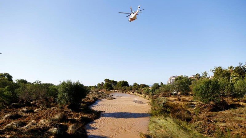 Search and rescue operations take place to look for two missing people along the Foix river which overflowed last night due to heavy rains, in Cubelles, Barcelona province, Spain July 13, 2025. REUTERS/Bruna Casas