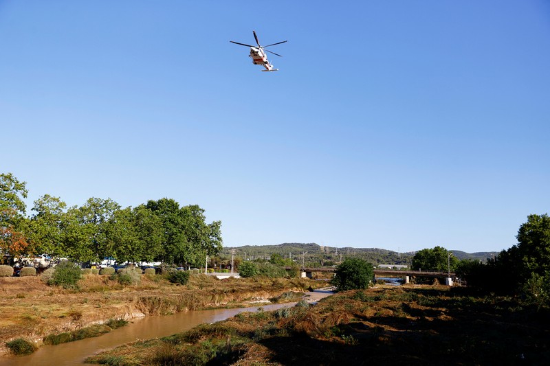 EUROPE-WEATHER/SPAIN-FLOODS Search and rescue operations take place to look for two missing people along the Foix river which overflowed last night due to heavy rains, in Cubelles, Barcelona province, Spain July 13, 2025. REUTERS/Bruna Casas