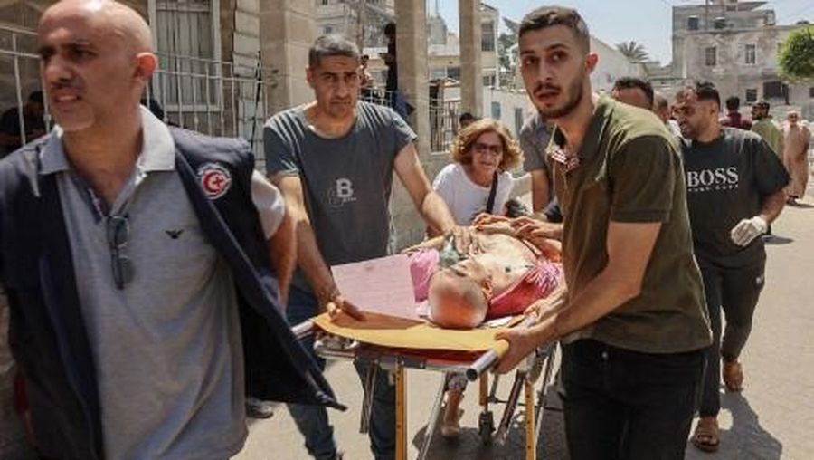 Palestinians who were injured in an Israeli strike on the Holy Family church receive treatment in Gaza City's Arab Ahli, also known as Baptist, hospital on July 17, 2025. The Latin Patriarchate of Jerusalem said an Israeli strike on Gaza's only Catholic church injured several people on July 17, including the parish priest, as well as causing damage to the building. (Photo by Omar AL-QATTAA / AFP)