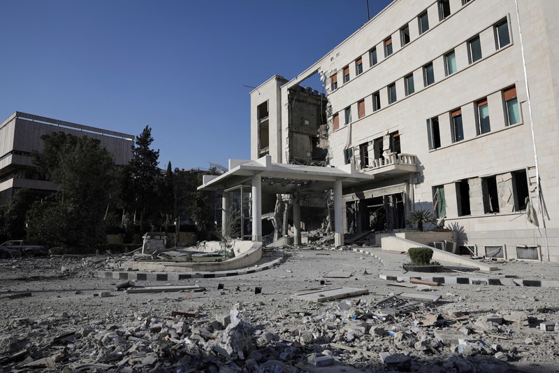 Smoke rises after Israeli strikes on Syria's defense ministry in Damascus, according to Al Jazeera TV, in Damascus, Syria July 16, 2025. REUTERS/Khalil Ashawi
