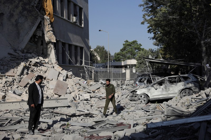 Smoke rises after Israeli strikes on Syria's defense ministry in Damascus, according to Al Jazeera TV, in Damascus, Syria July 16, 2025. REUTERS/Khalil Ashawi