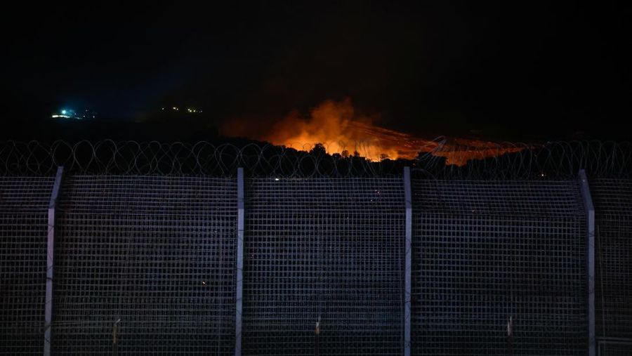 Smoke rises after Israeli strikes on Syria's defense ministry in Damascus, according to Al Jazeera TV, in Damascus, Syria July 16, 2025. REUTERS/Khalil Ashawi