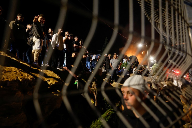 SYRIA-SECURITY/DRUZE-DAMASCUS Smoke rises after Israeli strikes on Syria's defense ministry in Damascus, according to Al Jazeera TV, in Damascus, Syria July 16, 2025. REUTERS/Khalil Ashawi