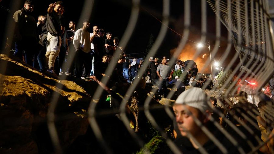 Smoke rises after Israeli strikes on Syria's defense ministry in Damascus, according to Al Jazeera TV, in Damascus, Syria July 16, 2025. REUTERS/Khalil Ashawi