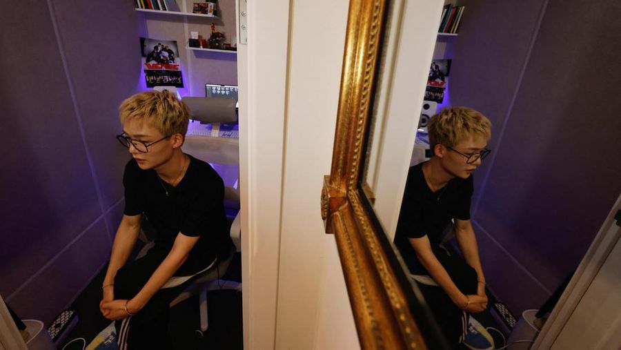 Members of K-pop boy band 1VERSE, including Hyuk and Seok who defected from North Korea, as well as Aito, Nathan and Kenny, perform their new single in front of a camera in Seoul, South Korea, May 21, 2025. REUTERS/Kim Soo-hyeon