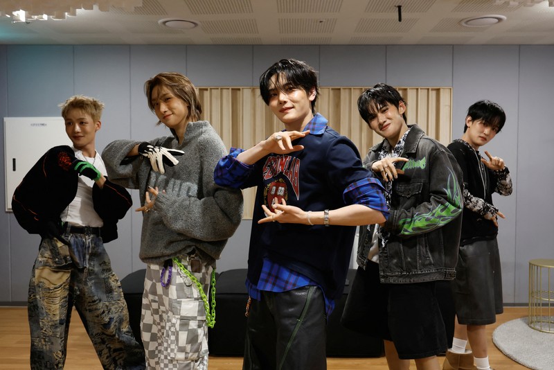 Members of K-pop boy band 1VERSE, including Hyuk and Seok who defected from North Korea, as well as Aito, Nathan and Kenny, perform their new single in front of a camera in Seoul, South Korea, May 21, 2025. REUTERS/Kim Soo-hyeon