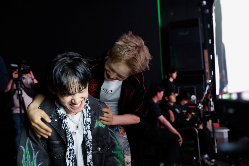 Members of K-pop boy band 1VERSE, including Hyuk and Seok who defected from North Korea, as well as Aito, Nathan and Kenny, perform their new single in front of a camera in Seoul, South Korea, May 21, 2025. REUTERS/Kim Soo-hyeon