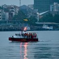 Sebuah kapal yang membawa wisatawan di sekitar Teluk Ha Long, Vietnam, terbalik akibat badai. Media pemerintah melaporkan sebanyak 34 orang ditanyakan tewas. Minggu (20/7/2025). (AFP/NHAC NGUYEN)