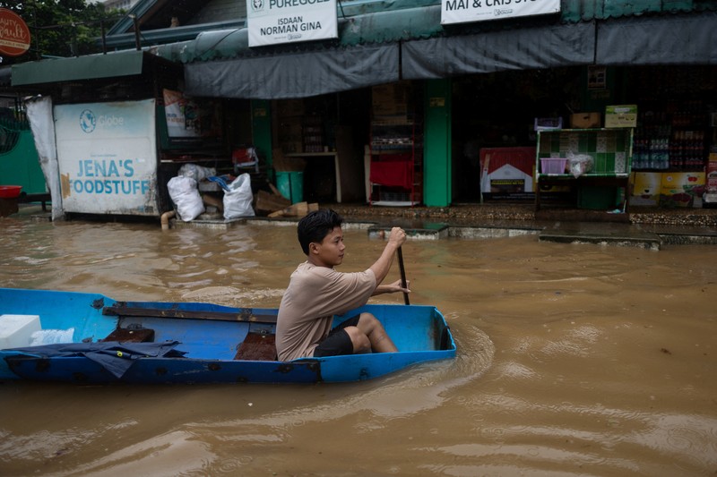 Hujan deres menyebabkan banjir di monsun di Cainta, Rizal, Filipina, Selasa (22/7/2025). Hujan deres menyebabkan banjir di monsun di Cainta, Rizal, Filipina, Selasa (22/7/2025). (REUTERS/Eloisa Lopez)