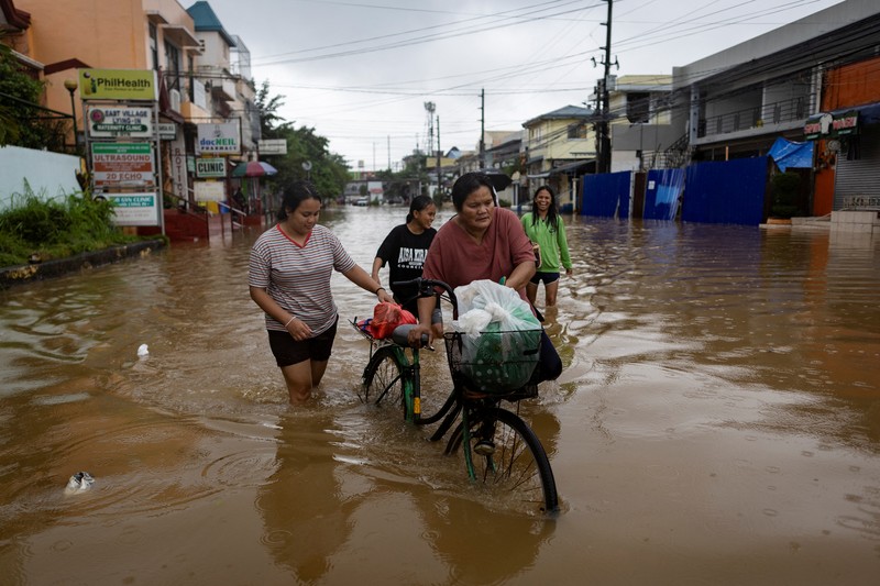 Hujan deres menyebabkan banjir di monsun di Cainta, Rizal, Filipina, Selasa (22/7/2025). Hujan deres menyebabkan banjir di monsun di Cainta, Rizal, Filipina, Selasa (22/7/2025). (REUTERS/Eloisa Lopez)