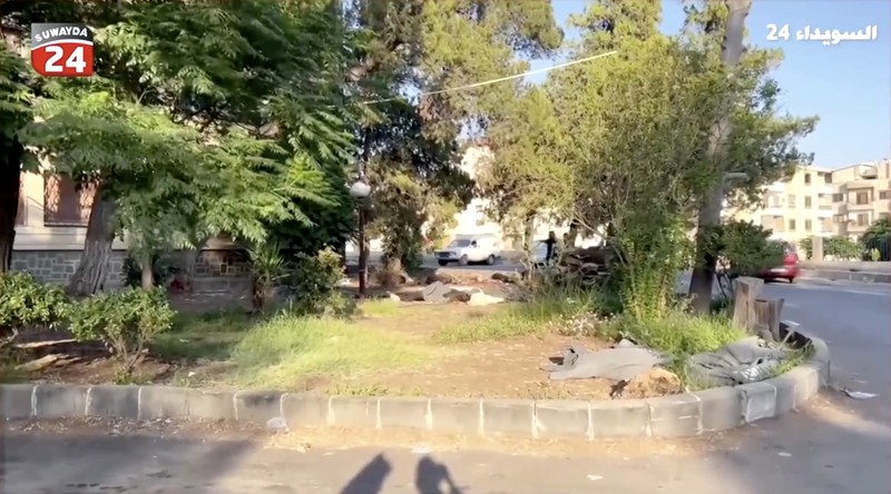 Rekaman video memperlihatkan kantong-kantong jenazah berserakan di halaman Rumah Sakit Nasional Sweida, yang dihuni mayoritas warga komunitas Druze, di kota Sweida, Suriah selatan, pada Minggu (20/7). Rekaman video memperlihatkan kantong-kantong jenazah berserakan di halaman Rumah Sakit Nasional Sweida, yang dihuni mayoritas warga komunitas Druze, di kota Sweida, Suriah selatan, pada Minggu (20/7). (Tangkapan Layar Video Reuters/Suwayda 24)