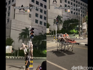 Muncul Tren Foto di Depan Hotel Mangkrak Banjarmasin Saat Dini Hari