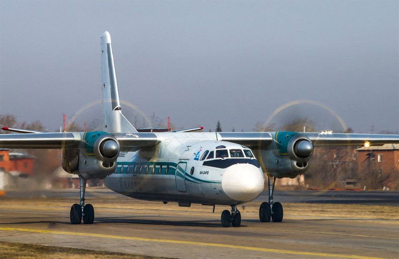 RUSSIA-AIRPLANE/CRASH SITE Smoke rises at the crash site of an Angara Airlines An-24 passenger plane near Tynda in the Amur Region, Russia July 24, 2025, in this still image taken from video. Federal Air Transport Agency/Handout via REUTERS ATTENTION EDITORS - THIS IMAGE HAS BEEN SUPPLIED BY A THIRD PARTY. NO RESALES. NO ARCHIVES. MANDATORY CREDIT.